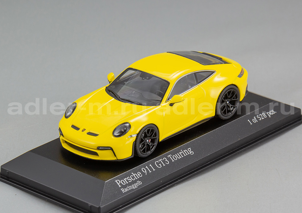 MINICHAMPS 1:43 Porsche 911 (992) GT3 Touring - 2021 (yellow, black wheels) 410069601