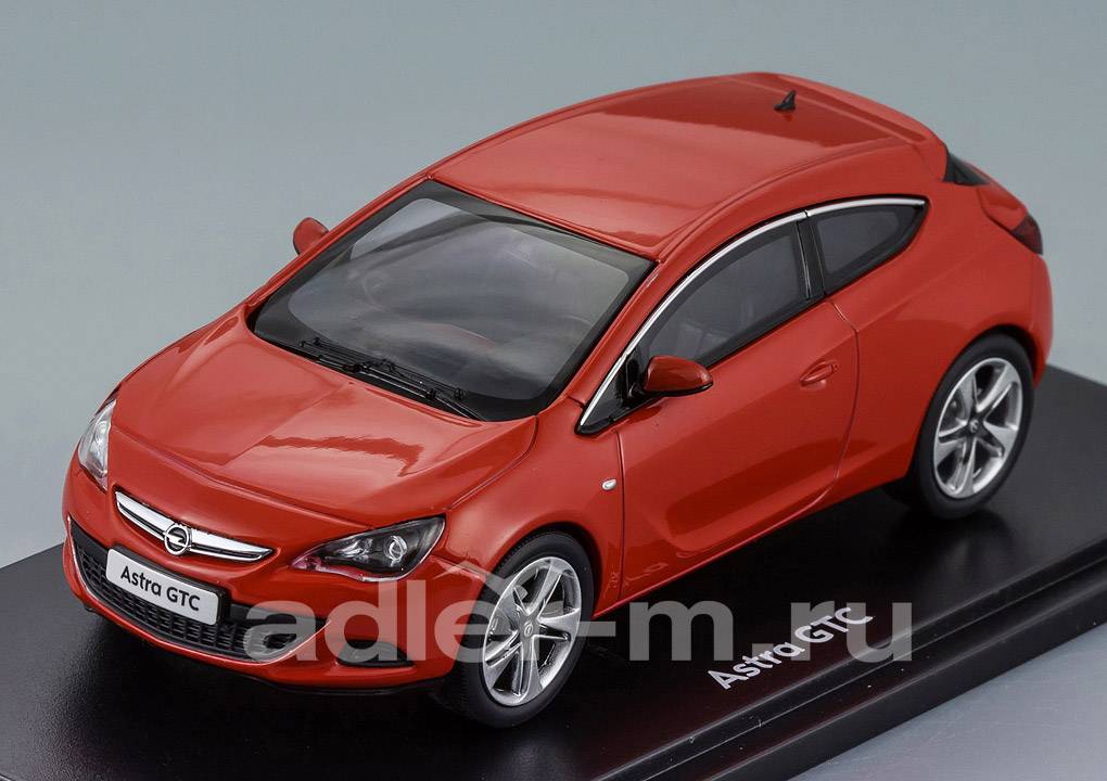 MOTORART 1:43 Opel Astra GTC 2010 (red) 4300864